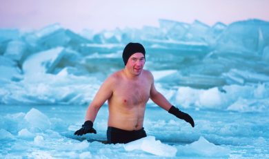 Man Dips In Ice Water