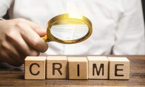 Man With Magnifying Glass, Blocks Spell Crime