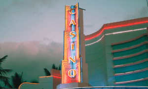 Neon Casino Sign Cloudy Sky