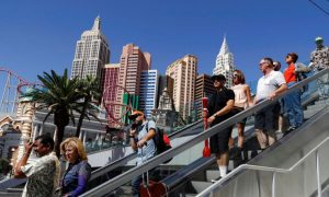 People Take Escalator Between Las Vegas Hotels