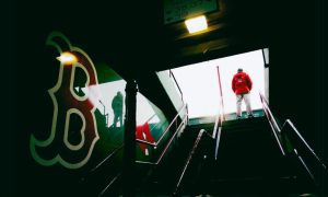 Boston Red Sox Staff Member Watches Exit