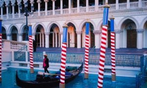 Gondolier Stands By Boat At The Venetian Las Vegas Casino