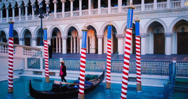 Gondolier Stands By Boat At The Venetian Las Vegas Casino