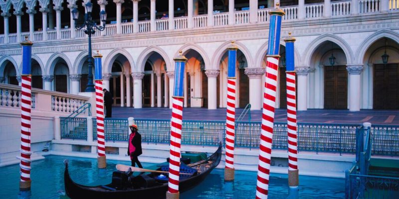 Gondolier Stands By Boat At The Venetian Las Vegas Casino