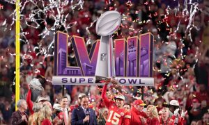 Kansas City Chiefs Quarterback Patrick Mahomes Raises Lombardi Trophy