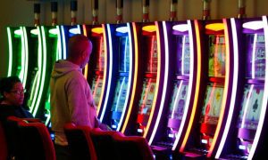 Patrons Play Gaming Machines At Rosie's in Richmond, VA