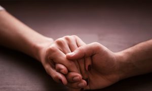 people holding hands