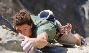 person climbing rock