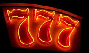 777 Red Neon Sign Slots Concept