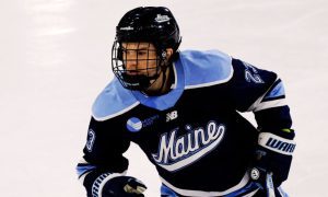 Maine Defenseman Grayson Arnott (23) Skates
