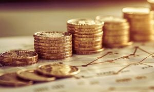 Stacked Coins On Financial Graph