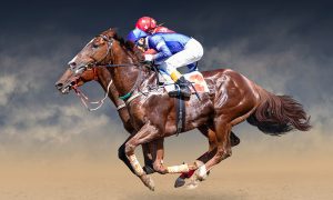 Two horses with jockeys in a tight race.