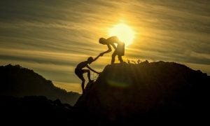 people climbing rock