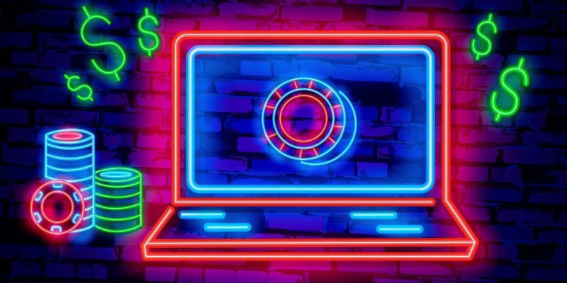 Laptop Neon Sign Online Casino Concept