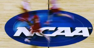 NCAA Basketball Players Run Across Court