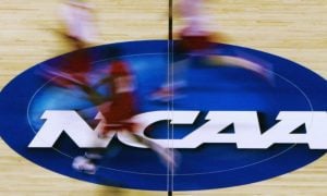 NCAA Basketball Players Run Across Court