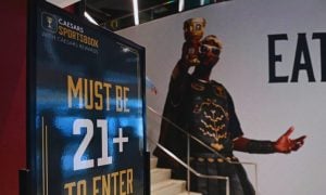 Sign Near Entrance Of Caesars Sportsbook