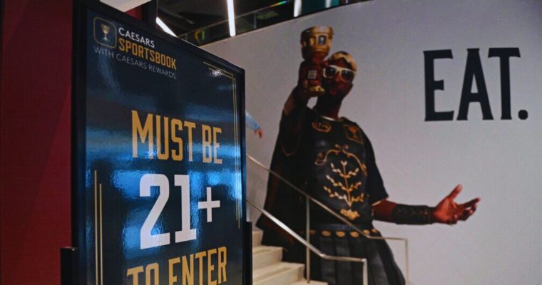 Sign Near Entrance Of Caesars Sportsbook
