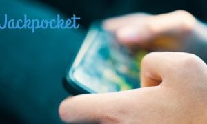 hands holding mobile phone