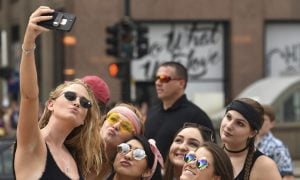 young people take selfies