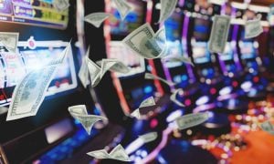 Cash Falls In Front Of Casino Slots