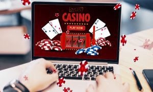 Man Plays Online Casino Games With Laptop