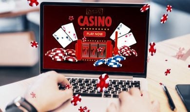 Man Plays Online Casino Games With Laptop