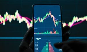 Market Revenue Line Graph On Cell Phone