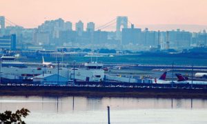 Planes Navigate LaGuardia Airport In Queens, NY