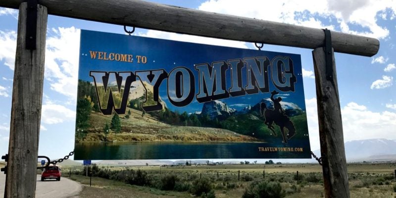 Sign On Border Of Wyoming