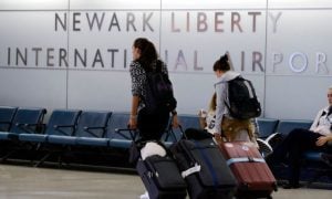 Passengers Pull Luggage At Newark Liberty Airport