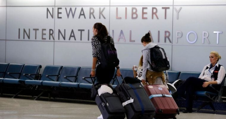 Passengers Pull Luggage At Newark Liberty Airport