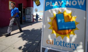 Wan Walks By California Lottery Sign