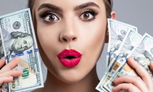 Woman Face Closeup Holds Cash