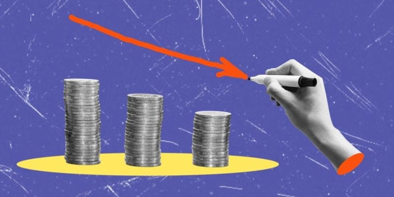 Declining Stacked Coins With Hand Drawing Arrow