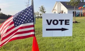Vote Sign And American Flag
