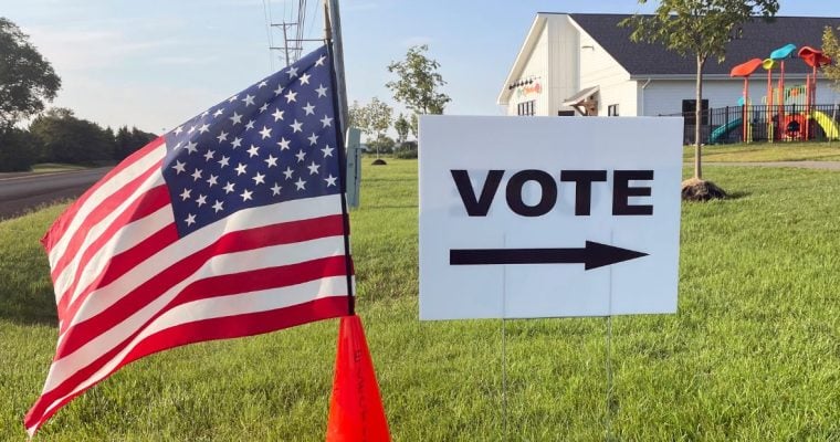 Vote Sign And American Flag