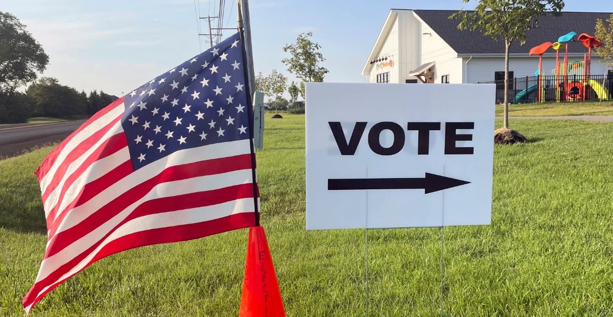Vote Sign And American Flag