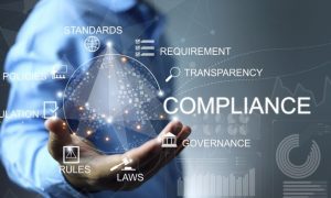 Business Man Holds Hand Out With Digital Sphere Compliance Concept