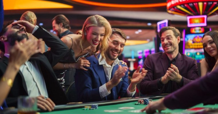 Happy People Gambling At Casino Table