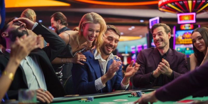 Happy People Gambling At Casino Table