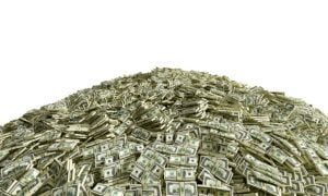 Huge Pile Of Stacked Cash In Dollars