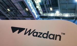 Wazdan Logo Displayed On Wall Inside Convention Hall