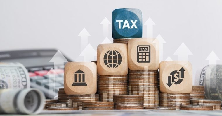 tax block on top of currency