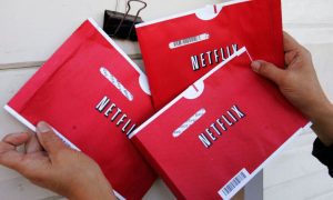 Old Netflix DVDs In Branded Red White Envelopes
