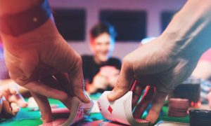Shuffling of a deck of cards at a poker table