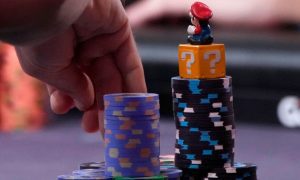 Super Mario Figure Rests On Espen Jorstad's Chip Stack WSOP Las Vegas