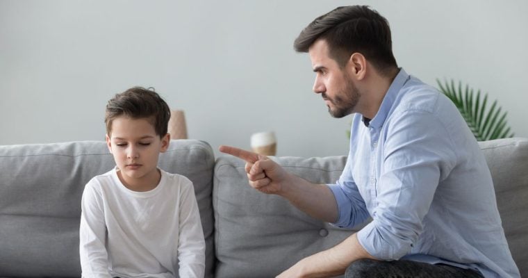 a man scolding his child