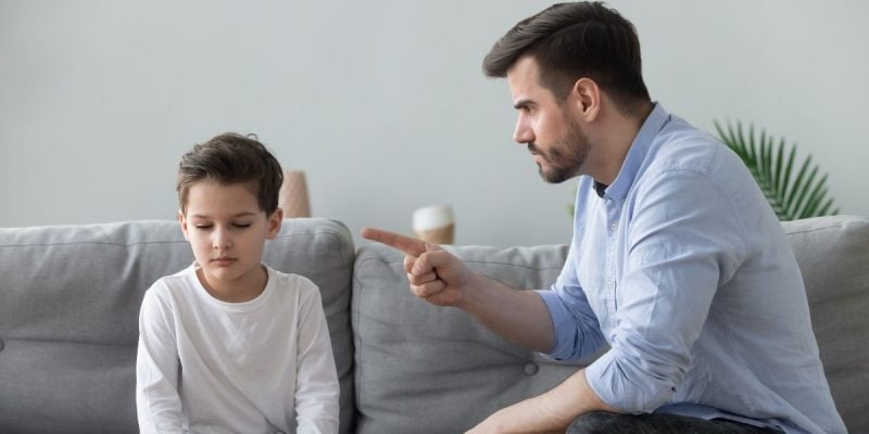 a man scolding his child
