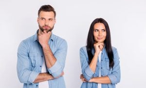 Man woman couple contemplating their options